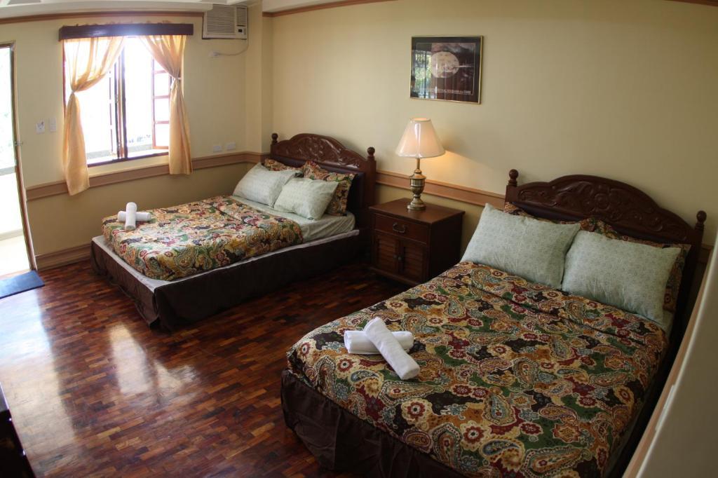 Ascendo Suites Puerto Princesa Ruang foto